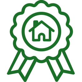 Green award rosette badge with a house in the middle icon