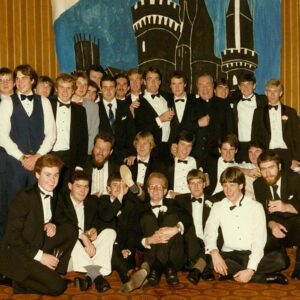 Alumni picture from 1986. Male student in tuxedos.