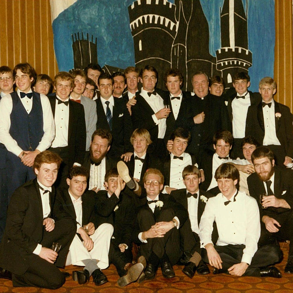 Alumni picture from 1986. Male student in tuxedos.