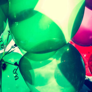 Transparent green and red ballons.