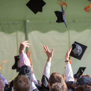 Graduation. Throwing caps into the air.