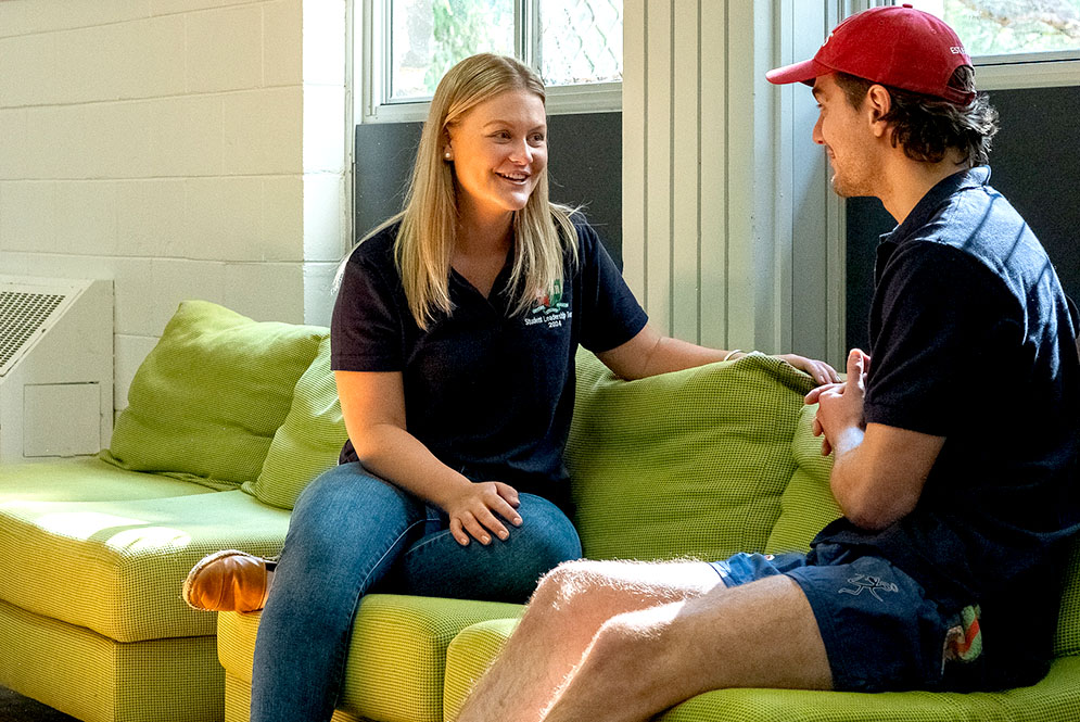 2 Students in Rec area talking